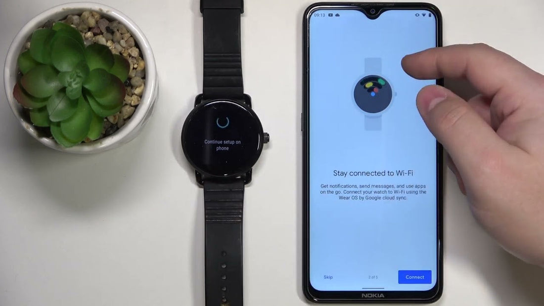 how to connect fossil watch to phone
